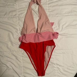 Tri-colored one piece. Swim.